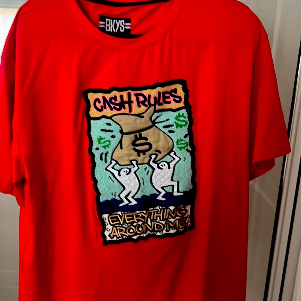 Red short sleeve tee shirt with custom log on the front